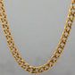 Back of yellow gold cuban link chain