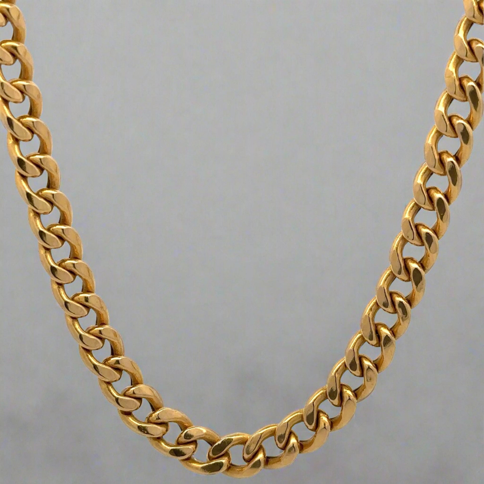 Back of yellow gold cuban link chain