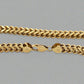 Close up of lobster clasp with 14K stamp and marks on clasp