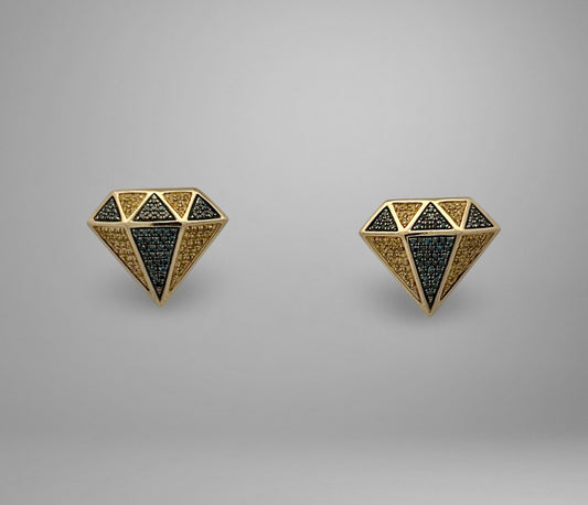 Pair of diamond-shaped earrings with blue and yellow diamonds on a gray background