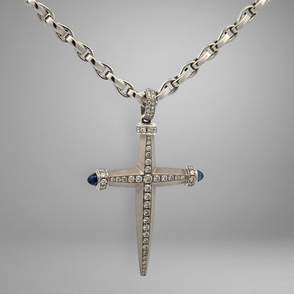 White gold link chain & cross pendant with diamonds and blue gemstones