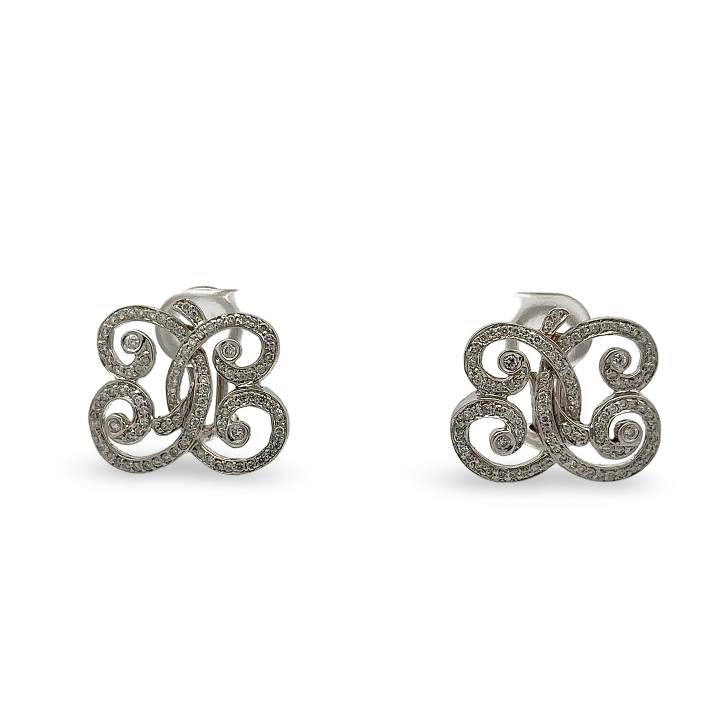 Pair of white gold diamond earrings with ornate design
