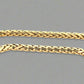 Close up of round yellow gold franco chain. Shows some scratches