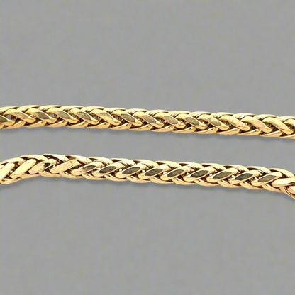 Close up of round yellow gold franco chain. Shows some scratches