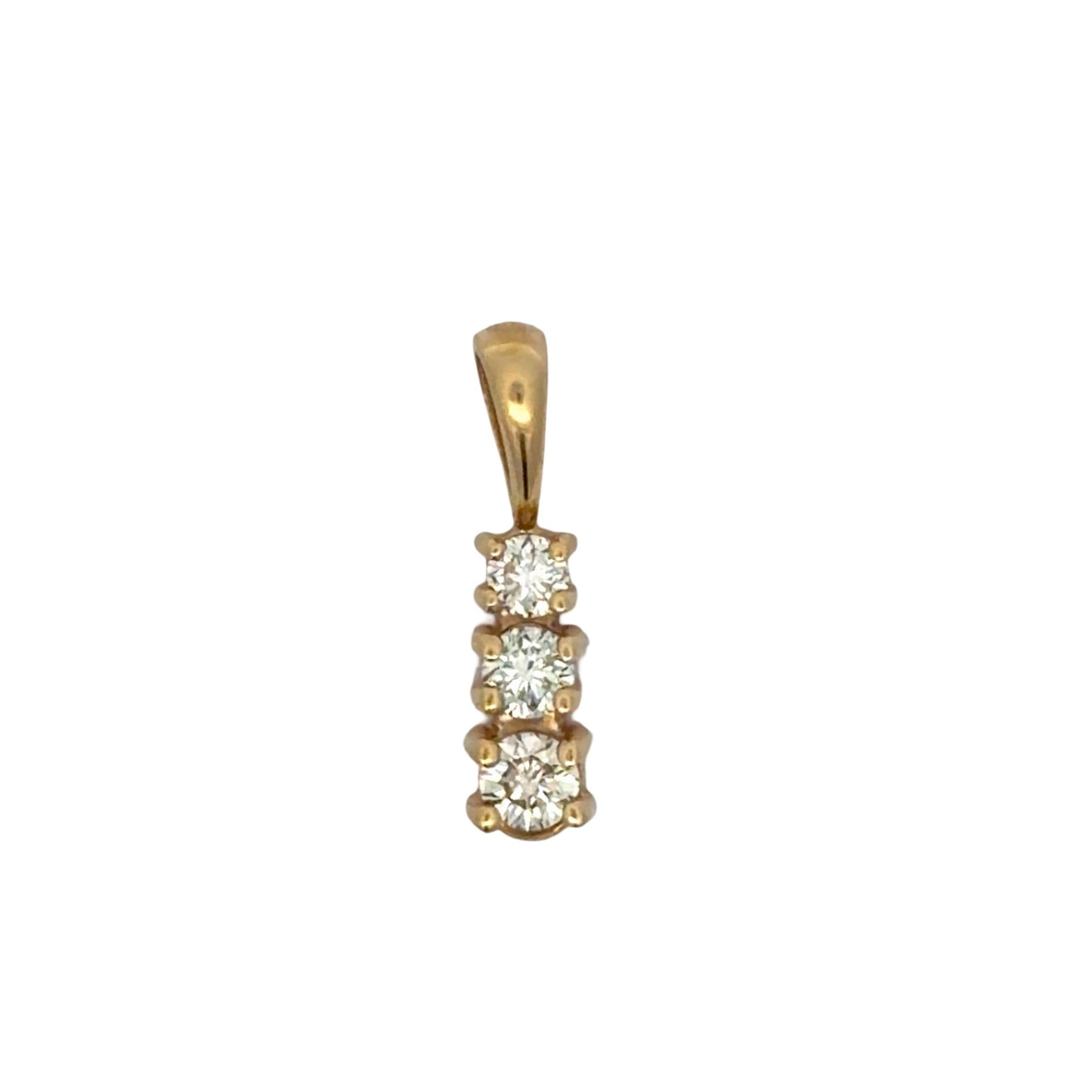 Gold pendant with three round diamonds on a white background