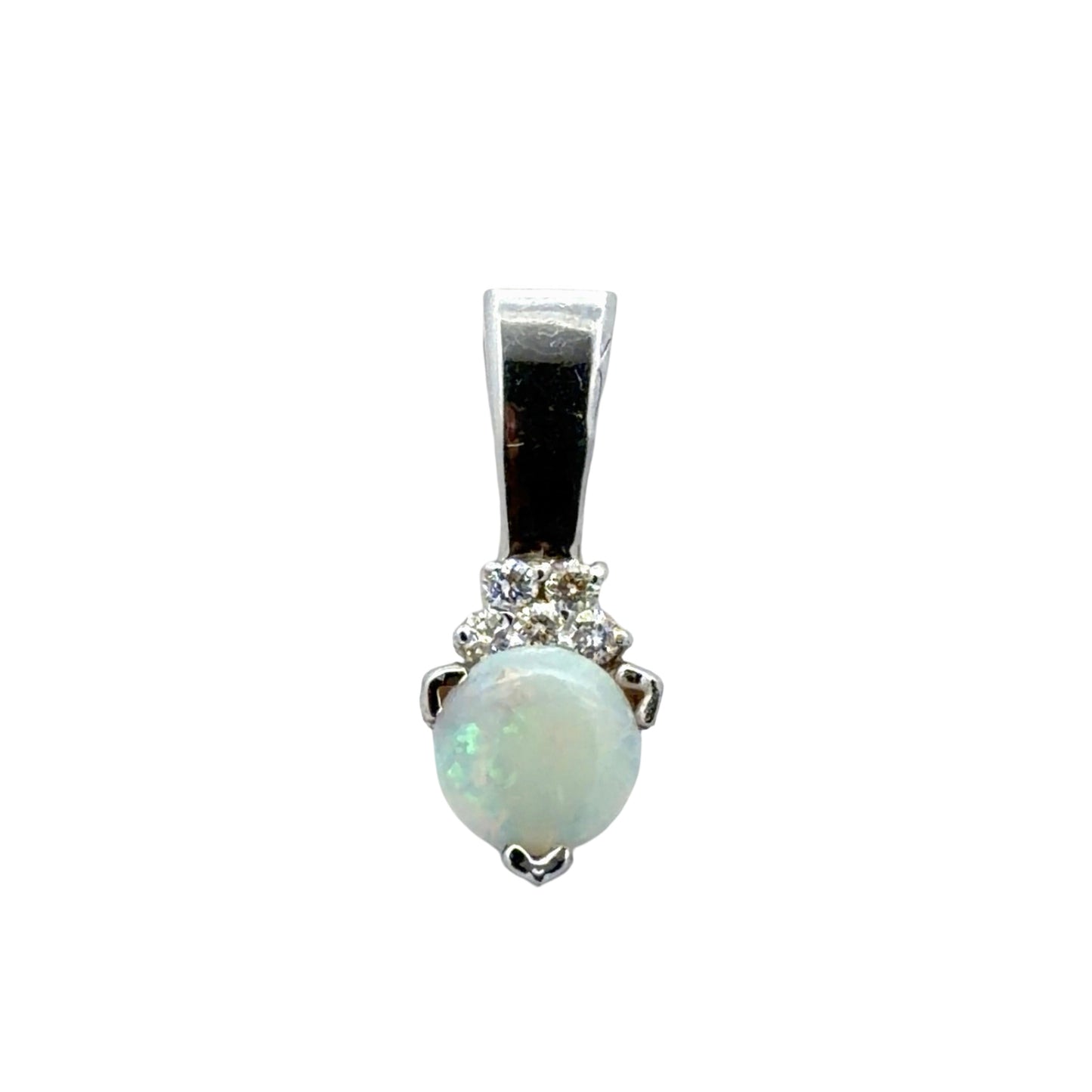 Opal and diamond pendant with white gold setting on a white background