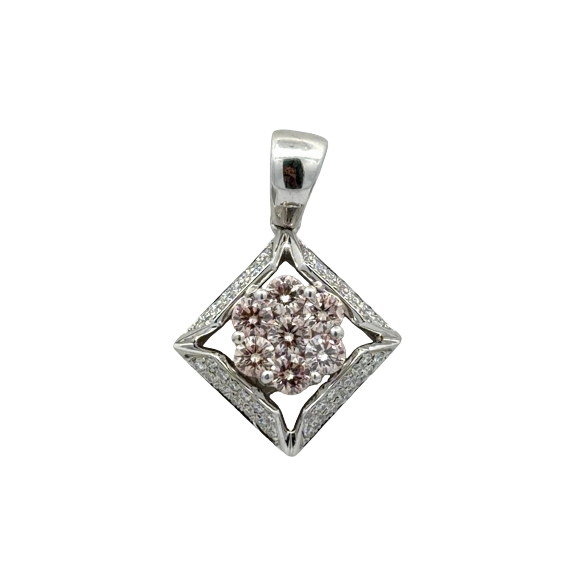 White gold pendant with champagne colored diamonds in the center and white diamonds on the sides in a square shape