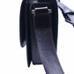 Side of black YSL bag with adjustable shoulder strap