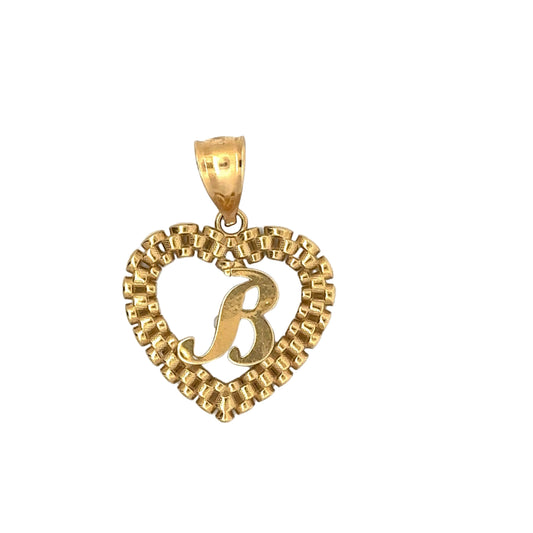 front of B heart rolex pendant in yellow gold with scratches on the B