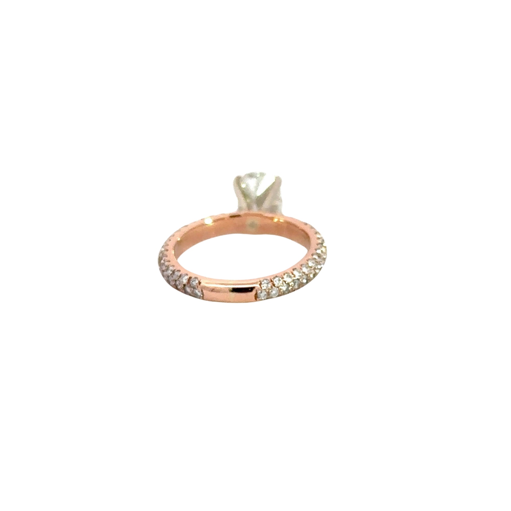 Back of rose gold ring with diamonds on the band