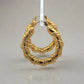 side view of yellow gold hoops with wrapped detailing