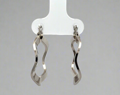 back of white gold wavy hoops