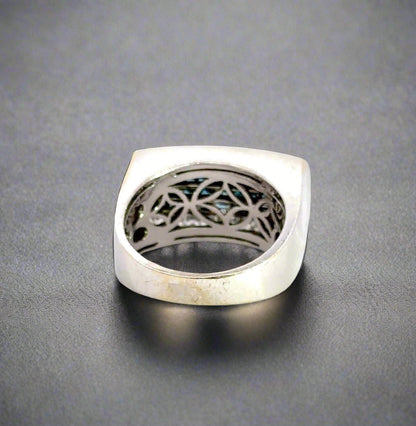 back of white gold ring with signs of wear on gold
