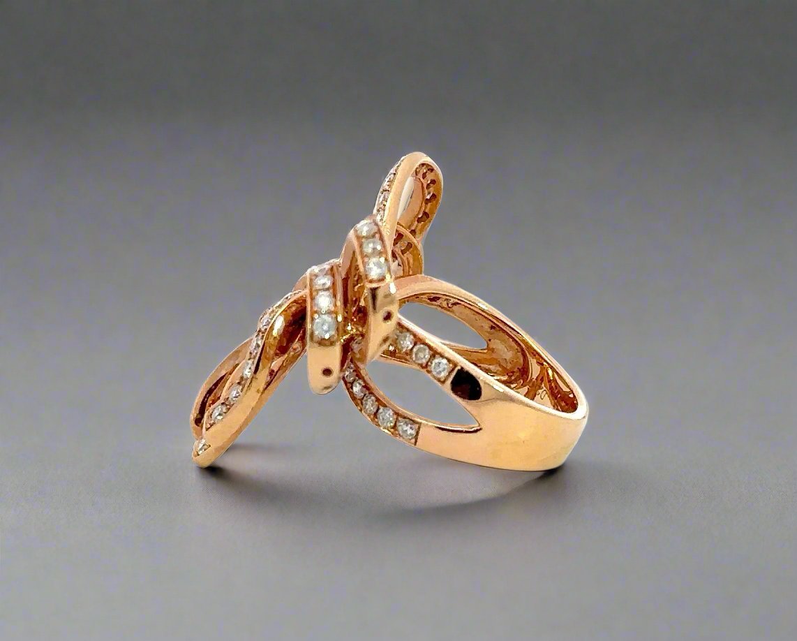 Side of rose gold bow ring