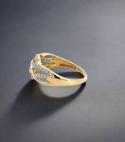 Side of yellow gold ring with 14K stamp and infinity sign engraved inside ring.