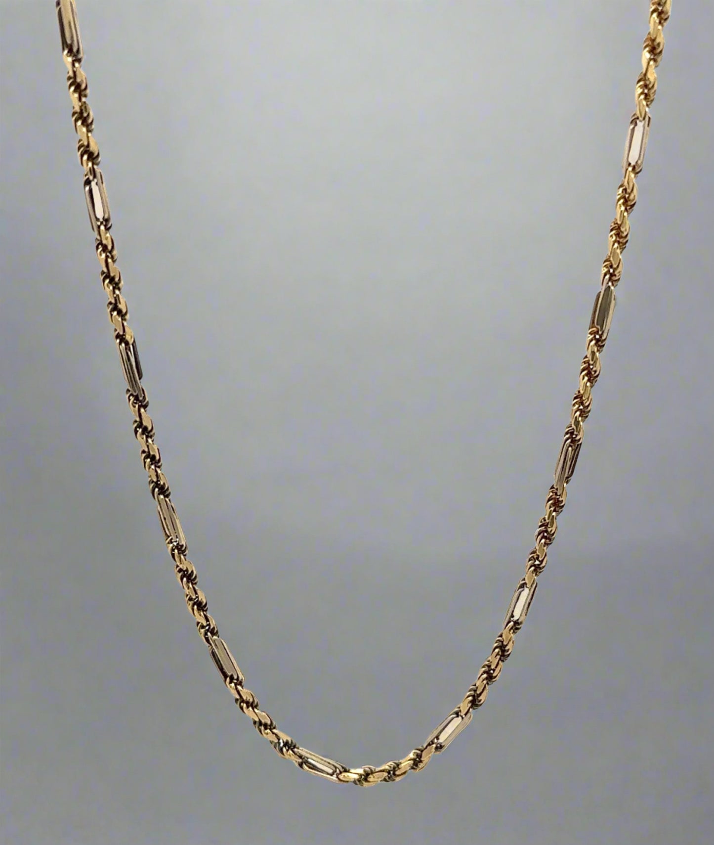 Front of yellow gold figarope chain