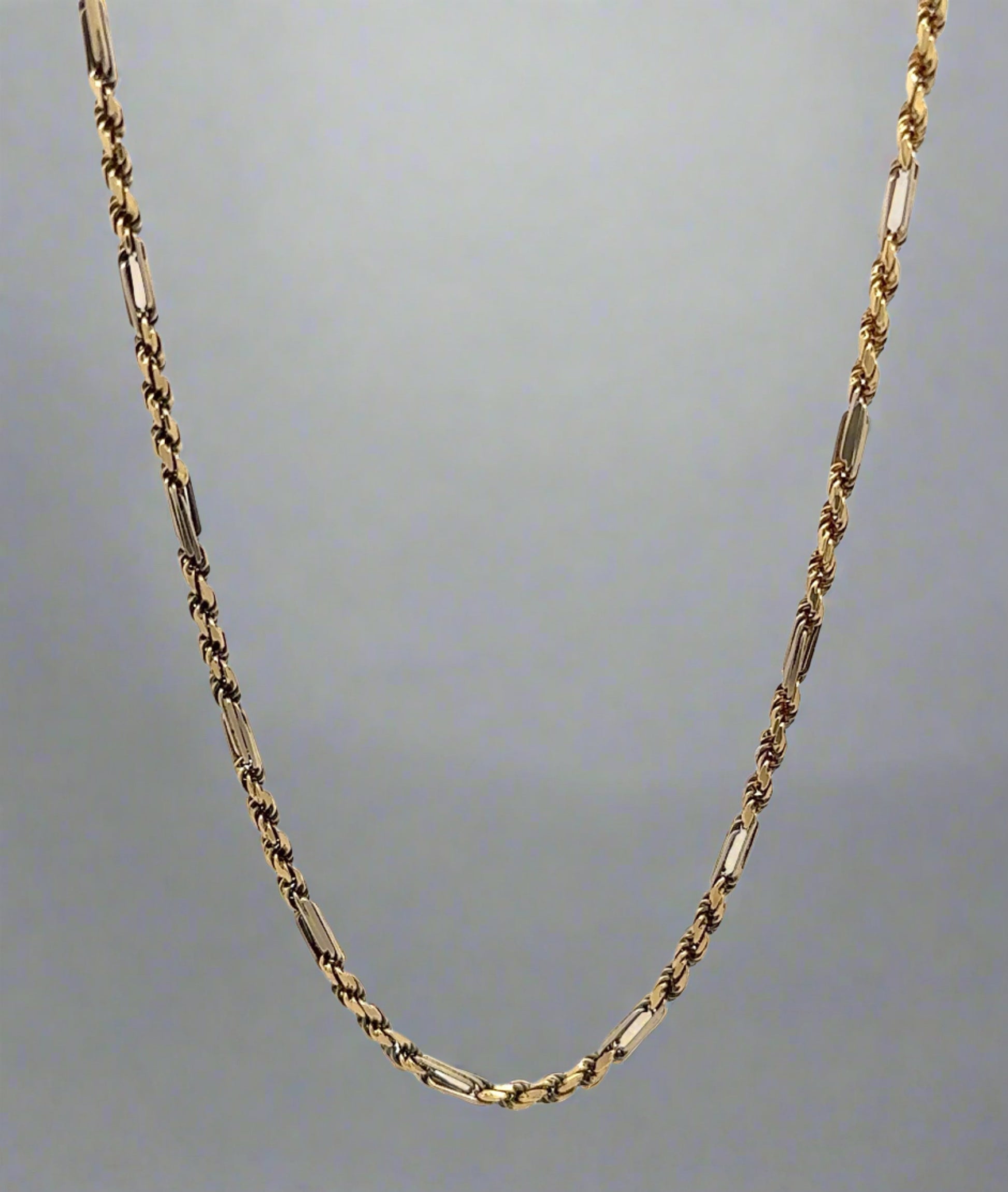 Front of yellow gold figarope chain