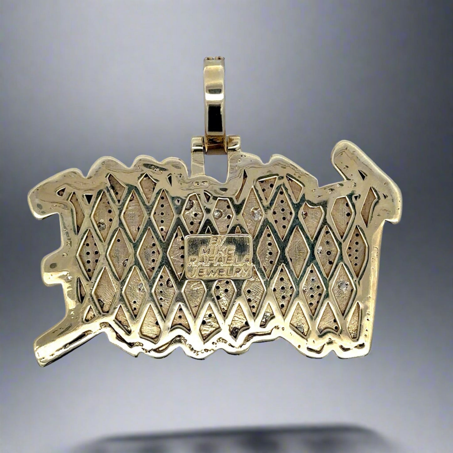 Back of Treasure pendant in yellow gold with "By Mike Rafaela Jewelry" stamp