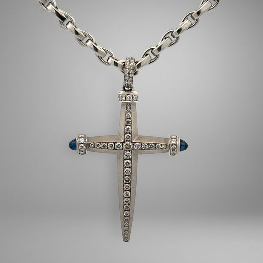 White gold link chain & cross pendant with diamonds and blue gemstones