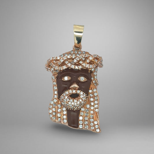 yellow and rose gold jesus face pendant with diamonds and dark enamel