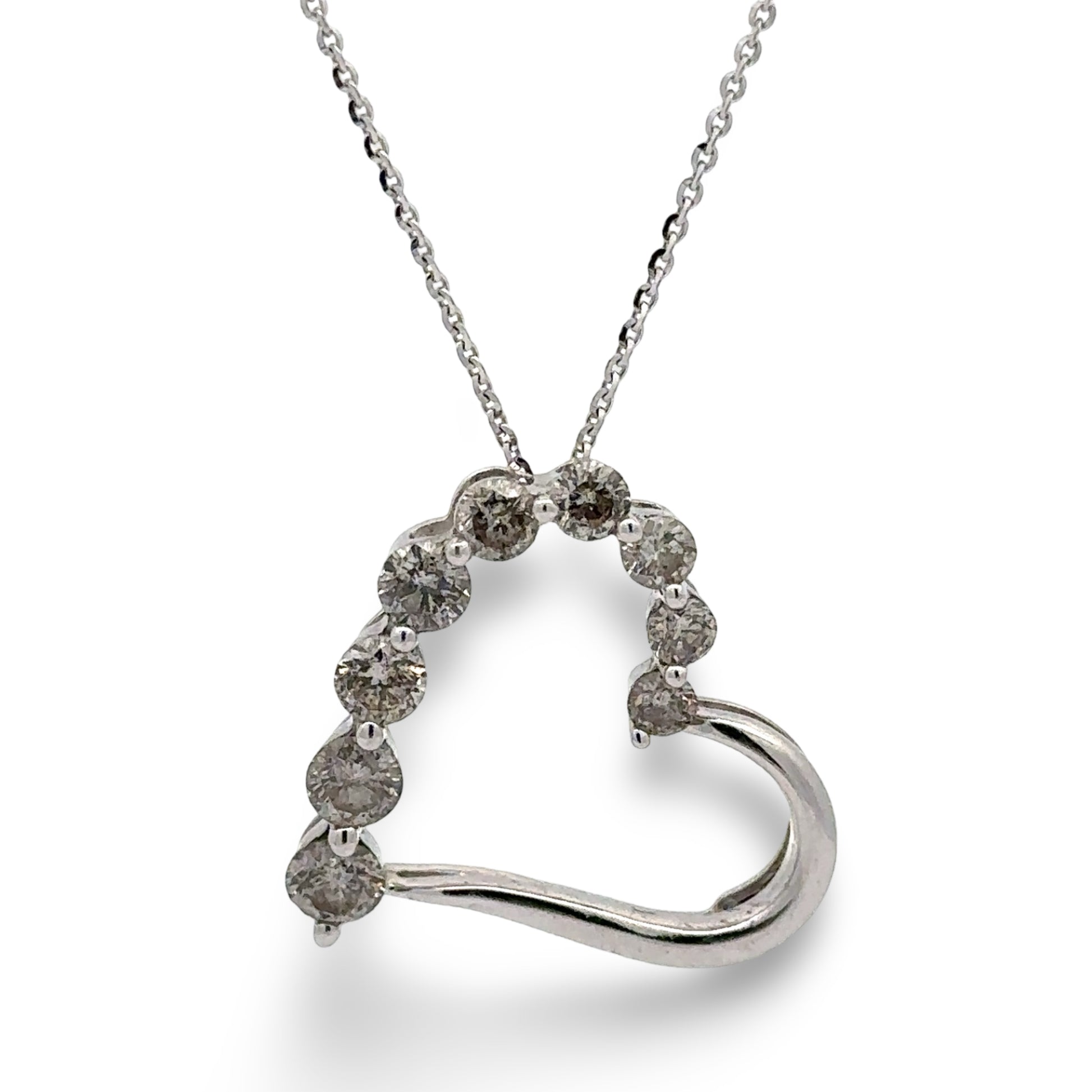 Open Heart-shaped diamond pendant on a chain against a white background