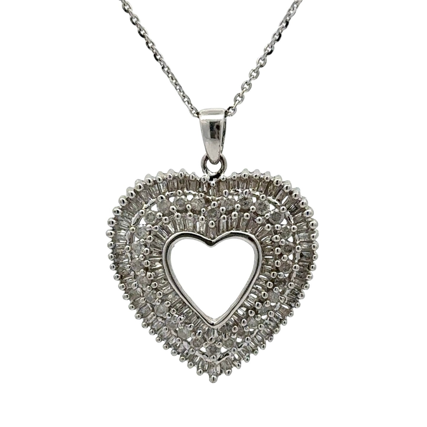 white gold heart-shaped pendant necklace on a white background