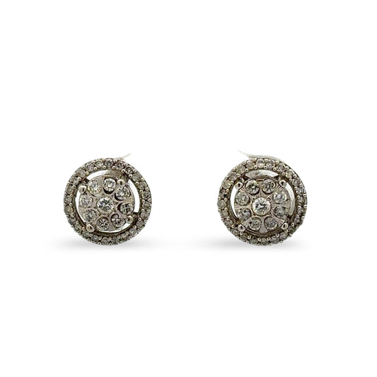 Pair of round earrings with diamonds on a white background