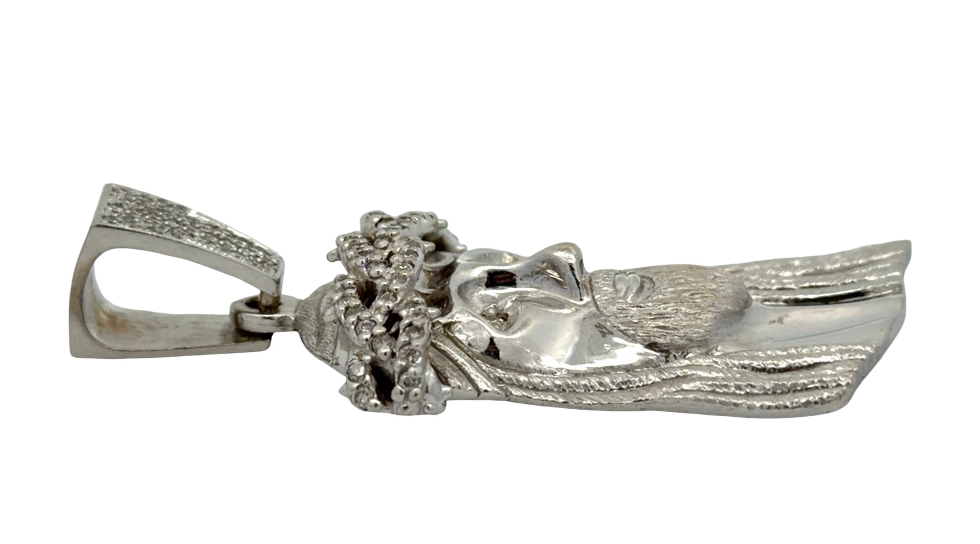 Side of white gold Jesus piece with minor wear