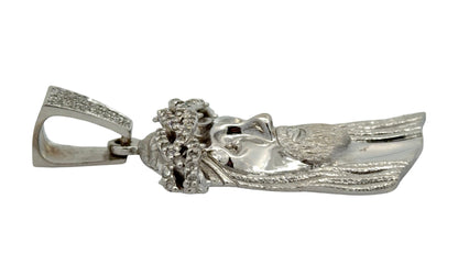 Side of white gold Jesus piece with minor wear