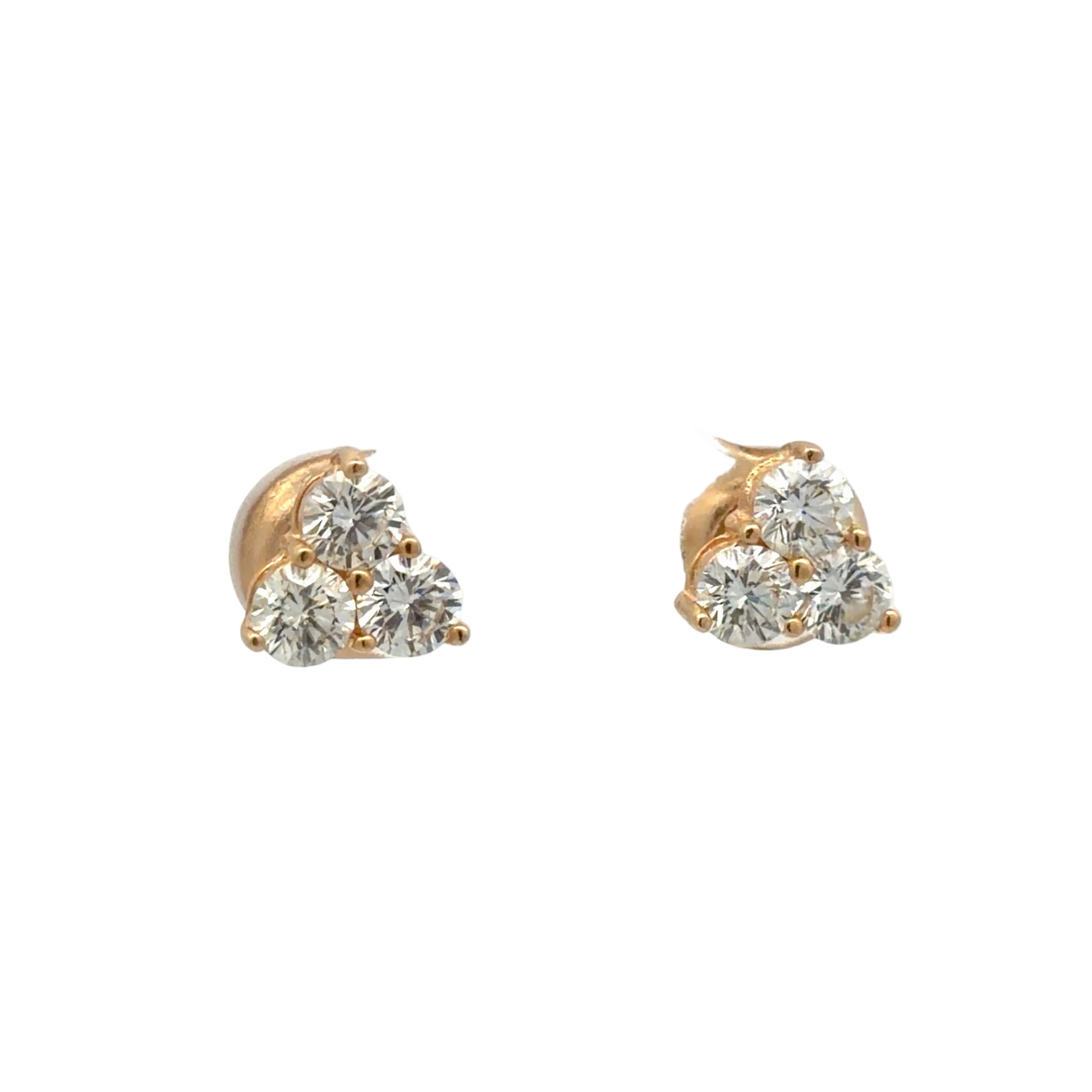 Gold and diamond stud earrings on a white background