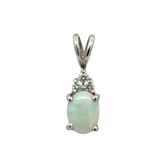 Opal pendant with diamond accents on a white background