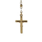Back of gold crossn pendant with 14K stamp on white background