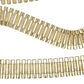 Close up of yellow gold rolex chain links on white background