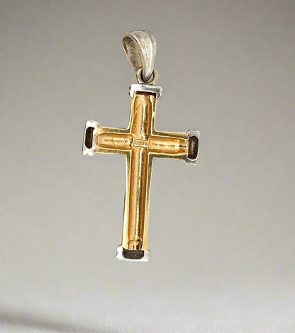 Back of yellow and white gold cross with hollow back, 14K stamp and scratches on gold