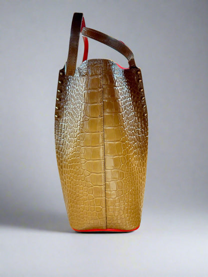 Side of brown tote bag.