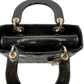 Top of small lady dior black patent leather bag