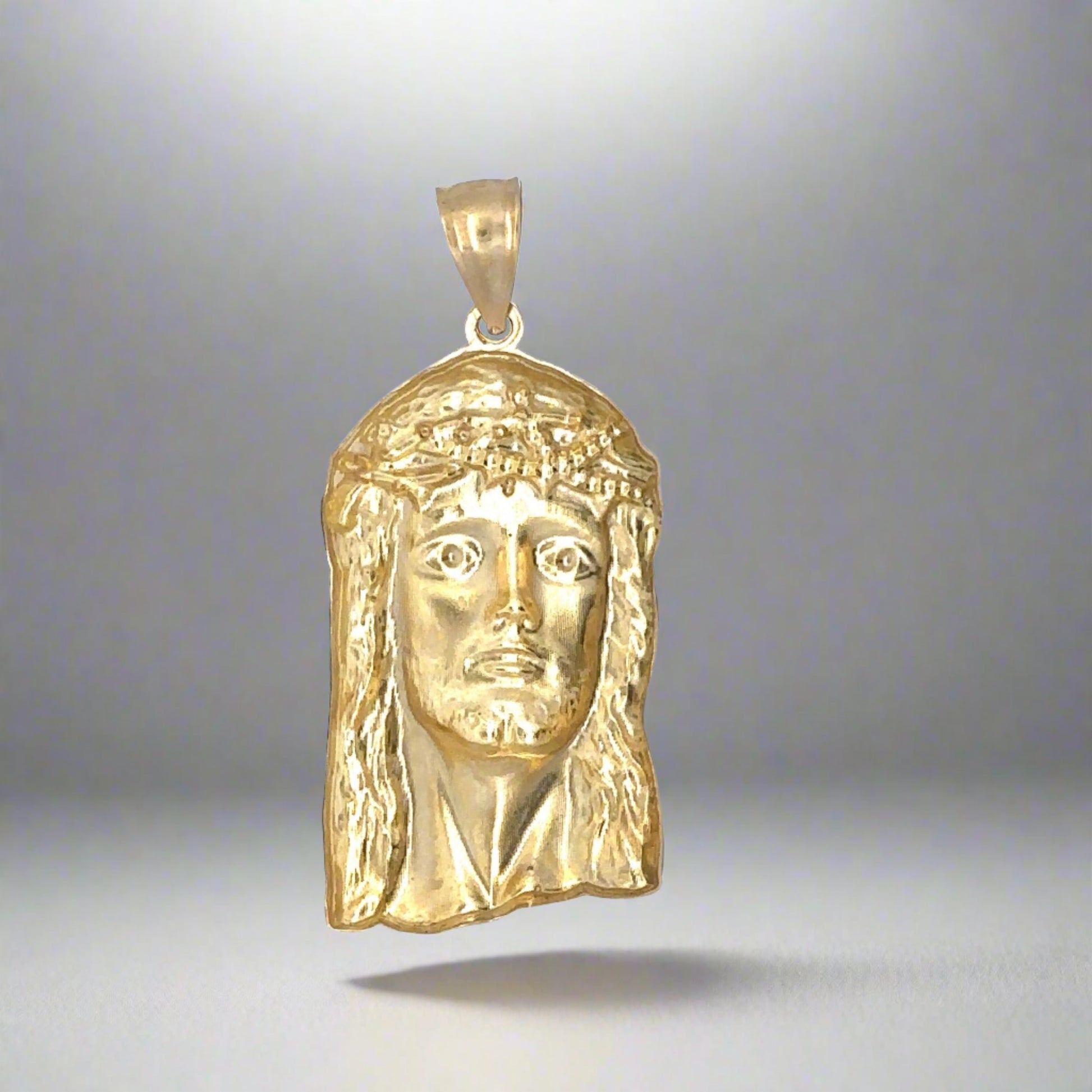 Back of jesus pendant with hollow gold