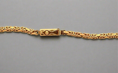 Box clasp with safety lock