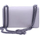 Back of white textured leather bag with silver adjustable chain