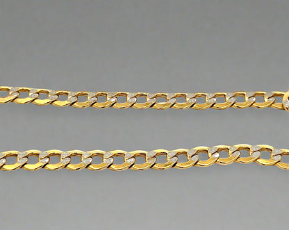 Close up yellow and white gold link chain