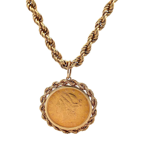 Thick yellow gold rope chain with yellow gold coin 1882 pendant with yellow gold rope detailing around coin