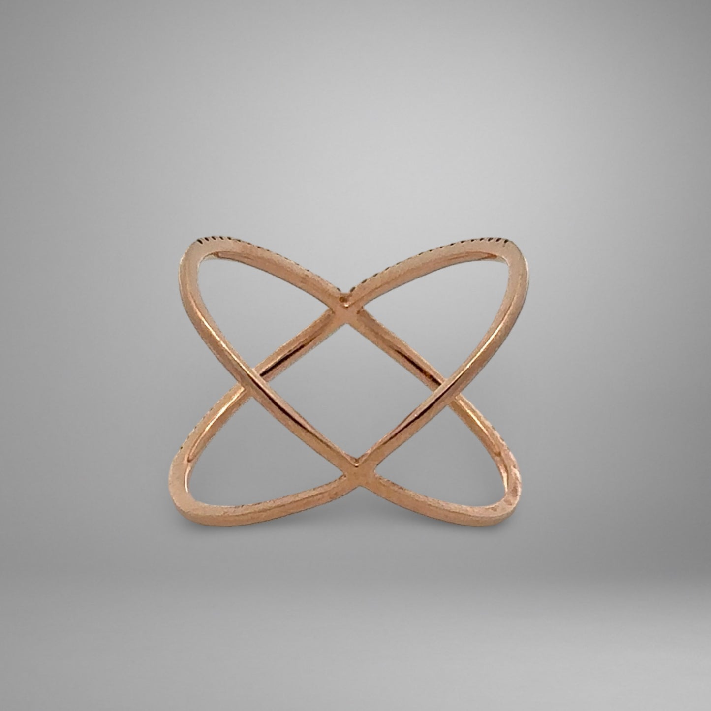 Rose gold crossover ring showing the back