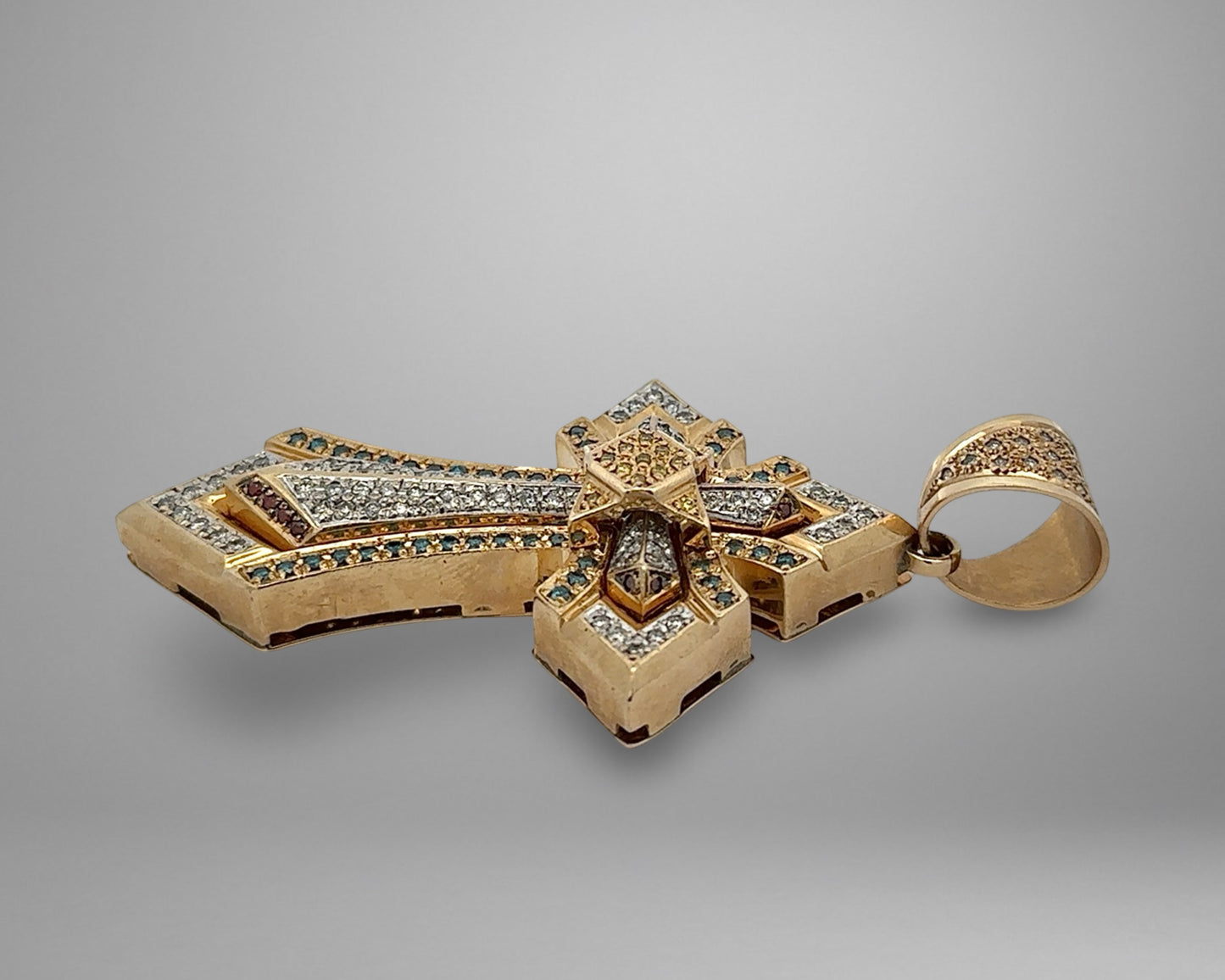 Side of yellow gold cross pendant