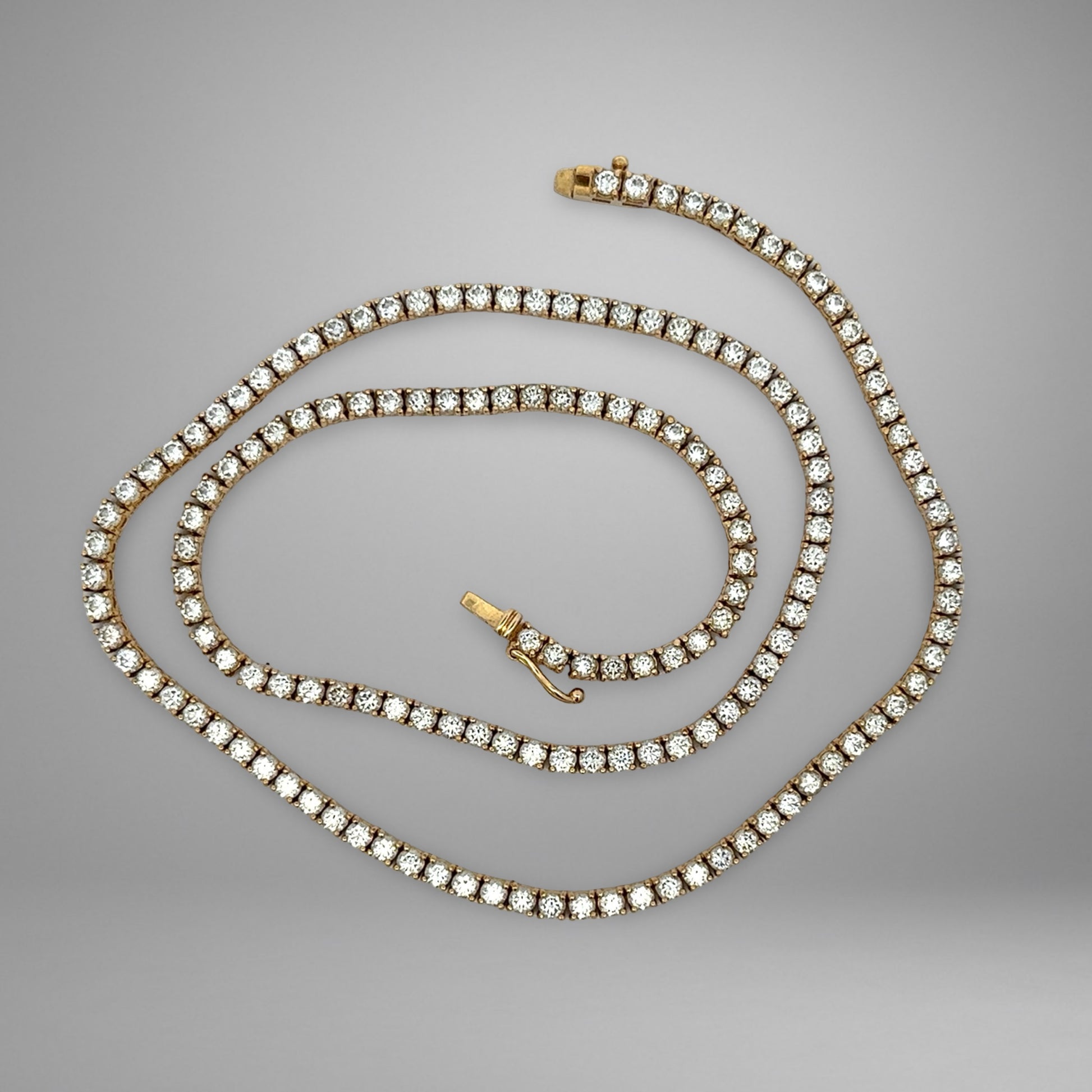 Diamond necklace on a gray background