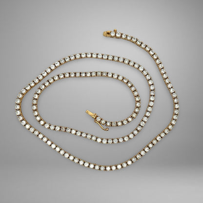 Diamond necklace on a gray background