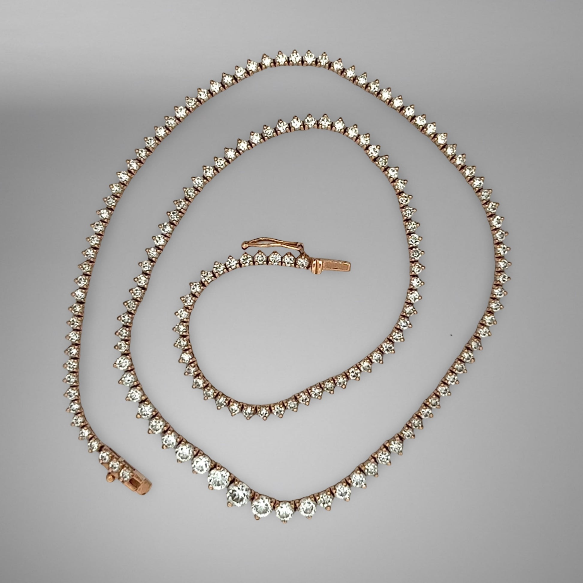 Diamond necklace on a gray background