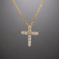 Front of diamond cross necklace with 11 round diamonds