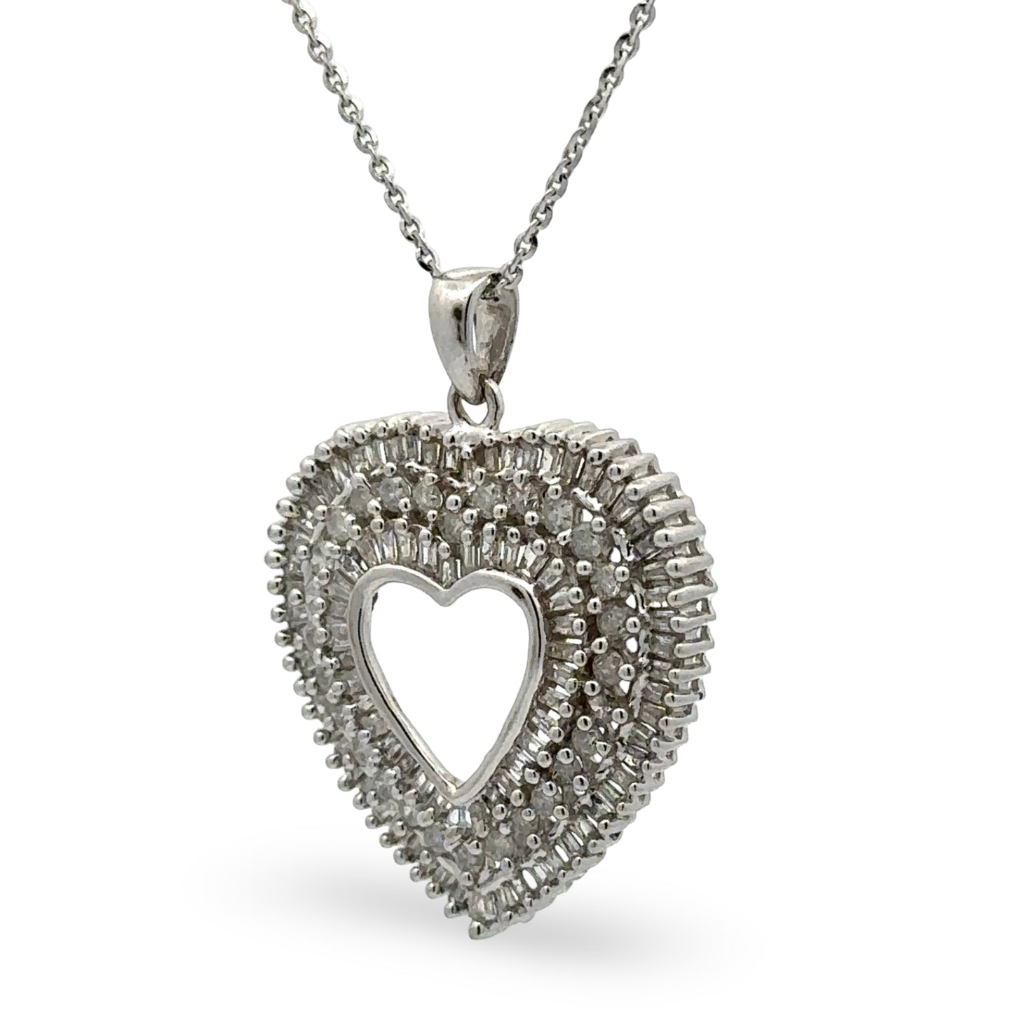 Heart-shaped diamond pendant on a white background