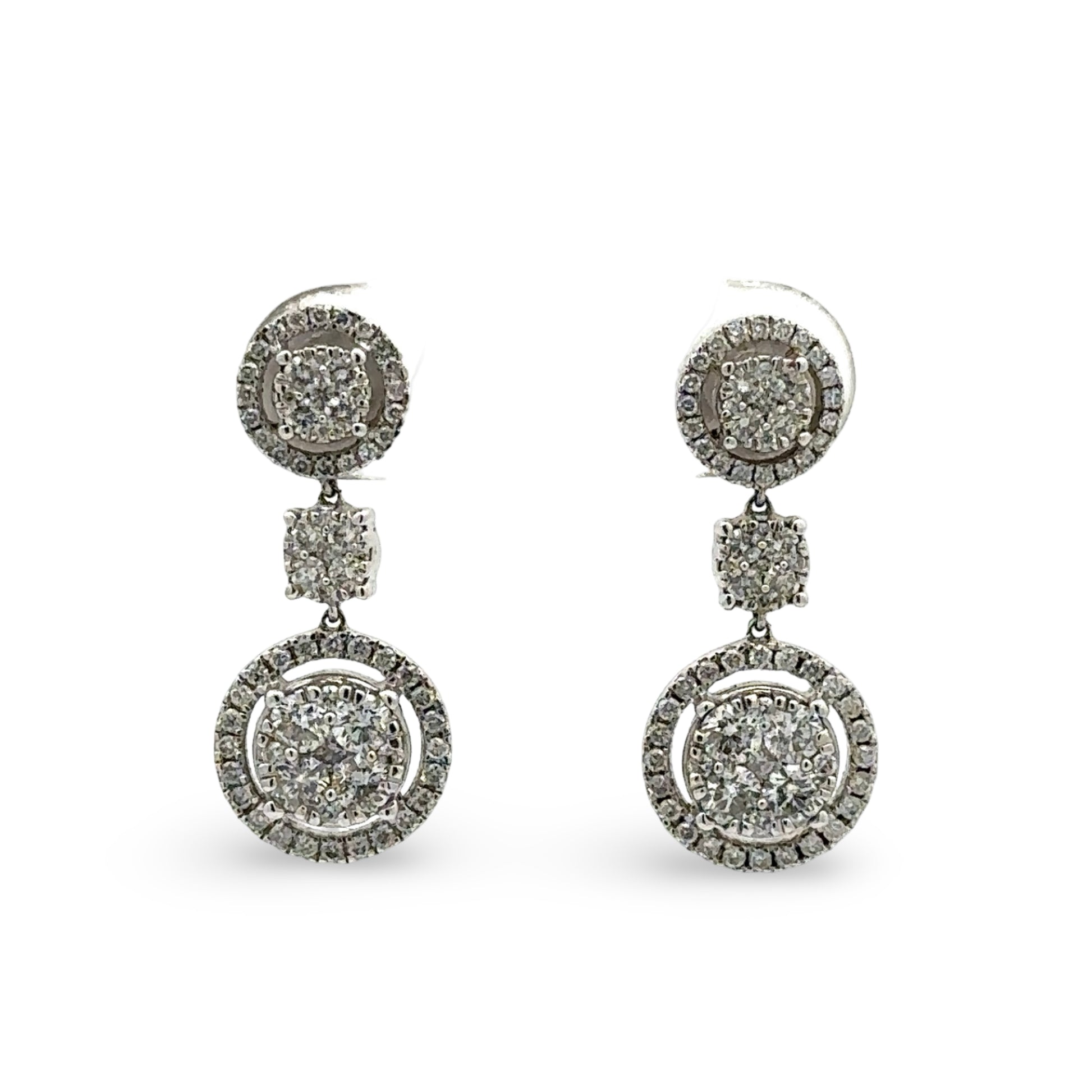 Pair of diamond drop earrings on white background