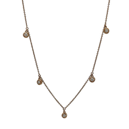 Necklace with small diamond pendants on a white background